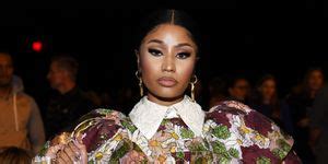 Nicki Minaj poses completely naked holding a birthday cake